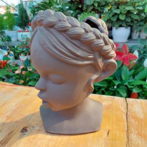 Chậu đất nung Bình Dương - Cô gái bím tóc miệng chậu 15cm ngang 11cm dọc chiều cao 26cm