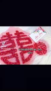 Chữ hỷ trang trí áo dài