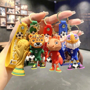 KEBIDUMEI 4PCS World Cup Soccer Mascot Keychain Pendant - Jaguar Eagle Moose Trophy for Football Fans Sporty Gift Bag Decor