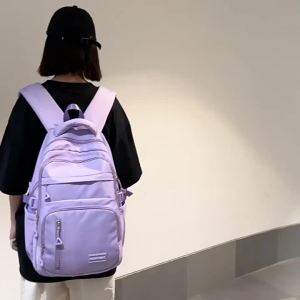 กระเป๋าหลังน้ำหนักเบาสำหรับนักศึกษาที่มีความจุมาก กระเป๋าเป้สำหรับผู้รักการเดินทางและกีฬากลางแจ้ง พร้อมช่องใส่คอมพิวเตอร์ด้านใน