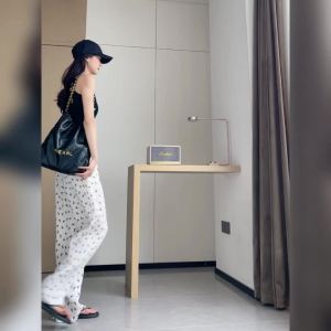 AMMIN กางเกงขาม้าเอวสูงผู้หญิงพับได้พิมพ์โบว์สไตล์เกาหลีสำหรับฤดูร้อน2024ใหม่บางหลวมกางเกงผู้ชายขาสามส่วนสวมใส่สบาย