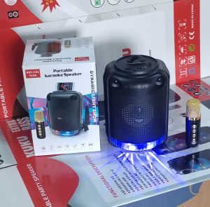 1102--PLUS  WIRELESS  MICROPHONE  BLUETOOTH   SPEAKER