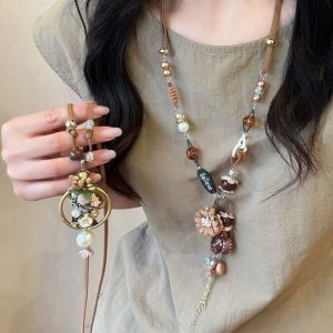 GUDAN ไม้สำหรับไม้ สร้อยคอสไตล์ชนเผ่า พู่ห้อยคอ ดอกไม้ประดับดอกไม้ สร้อยคอสไตล์โบฮีเมียน หวานหวานแหววว สร้อยคล้องคอ โซ่เสื้อกันหนาวยาว สำหรับผู้หญิง