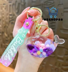 WESHOP88 1pcs Creative Glitter into Oil Floating Jelly Bean Keychain Acrylic Whale Liquid Keychain Car Key Pendant