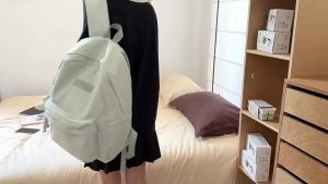 2026 High school girls backpack Middle school students college-style backpack Solid color simple and versatile backpack for college students