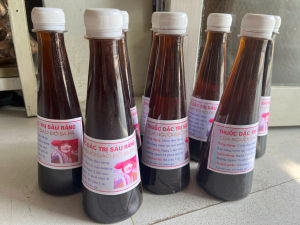 Lọ ngâm sâu răng của nười dao đỏ Sapa dùng cho người đau răng vi êm lợi hôi miệng