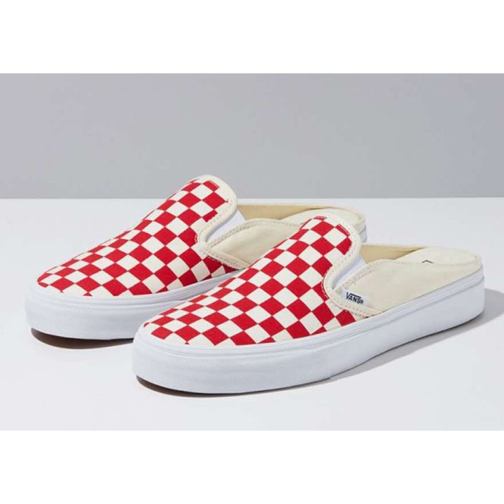 Half black half white slip hot sale on vans