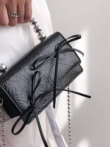 Unique designer handbag for women crossbodychain bag with black and white bow 2026 New cross-body headphone bag