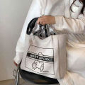 ARCTIC HUNTER Bag ผู้หญิงใหม่ กระเป๋าอเนกประสงค์กระเป๋าถือวิทยาลัยนักศึกษากระเป๋าสะพายกระเป๋ากระเป๋าขนาดใหญ่ความจุผ้าใบกระเป๋าผู้โดยสาร. 