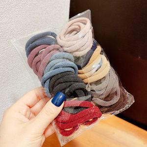 50ชิ้นยางยืดรัดผมสำหรับเด็กผู้หญิง4ซม. ที่คาดผมผ้าไนลอนสีสันสดใสสำหรับเด็กเครื่องประดับผมที่รัดผมเด็ก