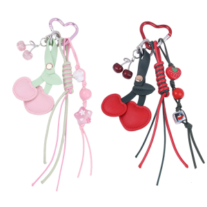 พวงกุญแจห้อยกระเป๋าพวงกุญแจรูปเชอร์รี่แฟชั่นที่มีดีไซน์ถักพวงกุญแจจี้กระเป๋าเป็นเอกลักษณ์สำหรับกระเป๋าเป้สะพายหลังและกระเป๋า