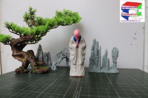 Nhà sư bái phật. nhà sư lạy phật Tăng nhân bái phật. tượng cúi trang trí bàn trà tiểu cảnh non bộ bể cá bon sai ghép lũa..