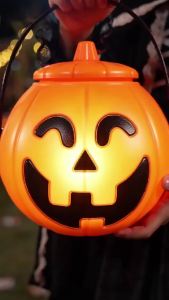 Halloween-themed pumpkin paper lantern decorations suitable for amusement park parties creating a festive atmosphere for children