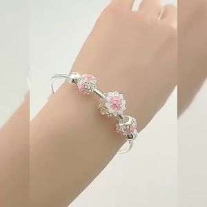 New Hot Sale Plated S Silver Palace Bell Bracelet for Women European and American Fashion Versatile Rotating Bead Ethnic Bracelet