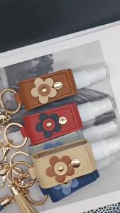 Specially designed for women summer toner bottle with retro leather case portable refillable bottle storage keychain pouch