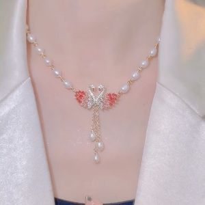 AE Douyin 2022 New trendy long sweater necklace with a unique design for women in autumn and winter featuring swan-shaped imitation natural freshwater pearls