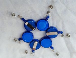 RETRACTABLE REEL BADGE ID CLIP AND KEY HOLDER