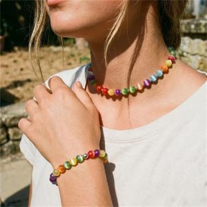 GJURD UV Reactive UV  Irradiation Color Changing Necklace Beads Cat Eye UV Reactive Choker Boho Layering Necklace Vintage Beaded Necklace Bracelet Set Beach Holiday