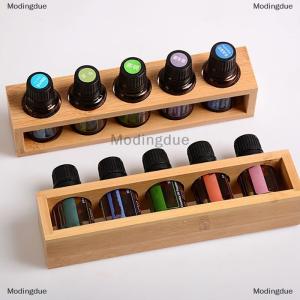 [COD] Modingdue แท่นวางแสดงน้ำมันหอมระเหยไม้ไผ่1ชิ้นชั้นเก็บน้ำมันหอมระเหย5รูเรียบสำหรับที่ใส่ขวดน้ำหอมน้ำมันหอมระเหย