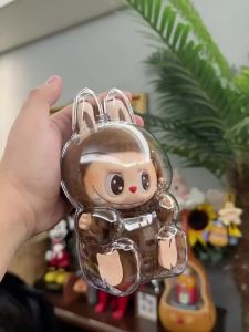 2025labubu กล่องเก็บของโปร่งใสป้องกันฝุ่นและสิ่งสกปรกสำหรับเก็บตุ๊กตาและของตกแต่งแบบพกพาสำหรับการเดินทางและงานปาร์ตี้ KHTD