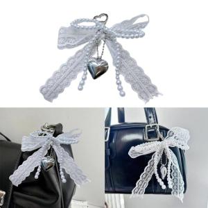 พวงกุญแจห้อยประดับด้วยลูกปัดไข่มุกเทียมรูปโบว์จี้หูกระต่ายสำหรับผู้หญิงหญิงสาว
