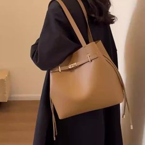 Túi xô mẫu mới túi xách tay nữ đơn giản túi đeo vai thời trang đa năng túi tote công sở dung tích lớn.