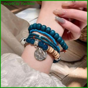 AngelCity Fashion Store 5pcs Bohemian Multi-Layer Rice Bead Bracelet Wings Pendant Elastic Rope Bracelet Ethnic Style Jewelry