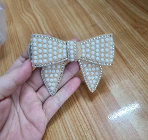 Nơ ngọc làm kẹp tóc nón túi xách balo