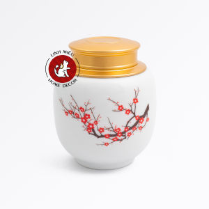 Hũ đựng trà bằng sứ men trắng nắp vàng kim sang trọng - họa tiết sen hoặc hoa đào