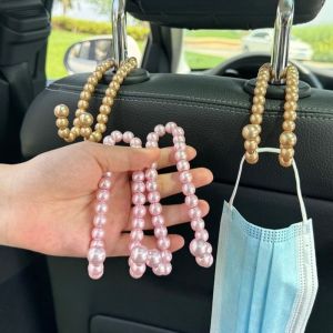 WPOT 2Pcs ที่แขวนแขวน ตะขอที่นั่งด้านหลังรถ แบริ่งด้านหลัง การจัดเก็บที่แข็งแกร่ง ตะขอแขวนมุกอัตโนมัติ ขายึดรถยนต์ น่ารักน่ารักๆ ตะขอพนักพิงศีรษะในรถยนต์ อุปกรณ์เสริมรถยนต์