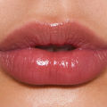 Sunnies Face Lip Treat [Moisturizing Tinted Lip Balm]. 