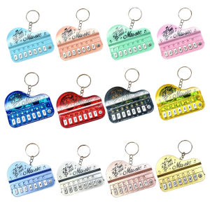 Pocket Sized Electronic Piano Keychain Toy With Multicolor Illuminated Keys Portable Music Learning Device For Children