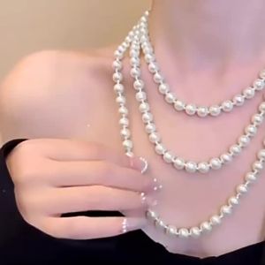 Dây chuyền ngọc trai dài nhiều lớp Shijia dành cho nữ dây chuyền áo len thanh lịch sang trọng nhẹ nhàng dây chuyền mùa thu/đông đa năng và cao cấp. 2026