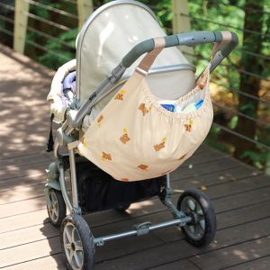 MIA การ์ตูน กระเป๋าเก็บของสำหรับรถเข็นเด็ก หลายฟังก์ชัน ความจุขนาดใหญ่ กระเป๋าแขวนรถเข็นเด็ก แบบสากล ขวดผ้าอ้อม กระเป๋าแม่ ของตกแต่งรถเข็นเด็ก