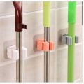 Móc dán tường kẹp giữ chổi, móc kẹp chổi, móc giữ cây lau, móc treo tường đơn giản tiện lợi. 