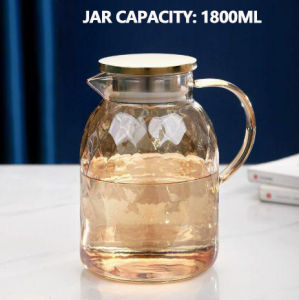 Golden glass cold water pitcher with stainless steel spout. Diamond-pattern borosilicate glass mug. Water outlet of the saucepan. Hot drinks. Cold drinks. Juice. Tea filter. Lid.