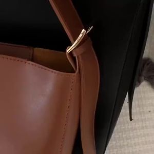 Sling Bag for Women: Wide Shoulder Strap & Trendy Bucket Bag with Free Pouch