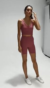 alo Yoga vest with built-in chest pads designed to enhance the back and provide a flattering silhouette high-elasticity sports bra set for women