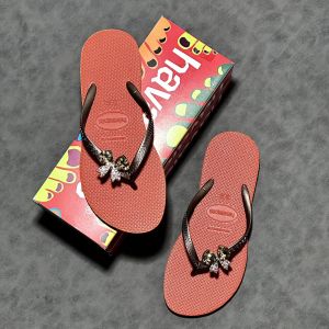 Dép kẹp xỏ ngón nữ Havanas tông lào mũi tròn đính Charm Nơ đế cao su nhiều màu lựa chọn bền bỉ êm ái thời trang.