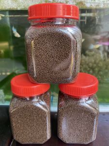 Thức ăn cho cá - Cám viên nổi không dơ nước siêu đạm giúp cá tăng tưởng lên màu nhanh thích hợp cho bảy màu và betta