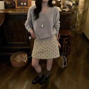 Chân váy midi nữ mới đầu thu 2026 họa tiết kẻ caro jacquard nơ retro
