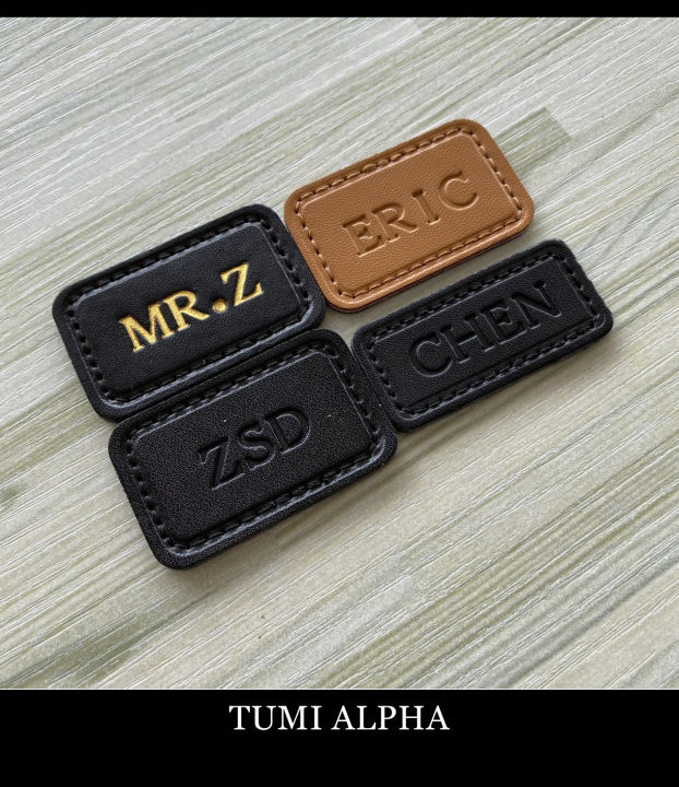 Name shop tag tumi