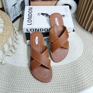 Womens Cross Strap Sandals Key attributes: Brown black beige colors flat sole open toe casual fit Use: Summer footwear Scene: Indoor display on textured rug