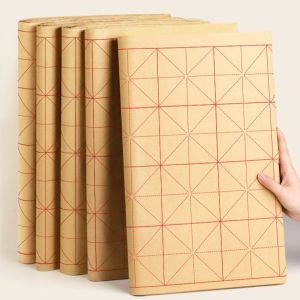 Giấy tập viết thư pháp kẻ ô mễ màu vàng kích thước 39x65cm 70 tờ ô 9cm luyện chữ