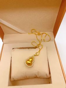 AE Gold-plated brass fashion pendant with diamonds gourd-shaped womens niche design rotating pendant direct sale from manufacturer