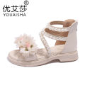 Children's beach shoes in the summer of 2023 new girls camellia Roman sandals baby casual shoes small flower shoes.. 