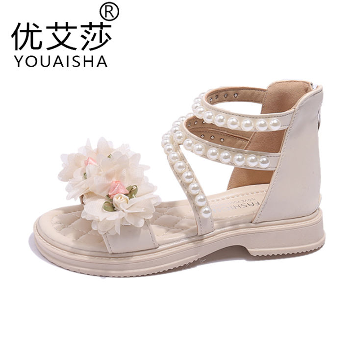 Children's beach shoes in the summer of 2023 new girls camellia Roman sandals baby casual shoes small flower shoes.