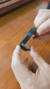 Magnetic phone holder with clip-on design and magnetic base. Compatible with non-magnetic phones