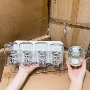 Kệ để bàn chải đánh răng hình gấu có kèm cốc và bộ nhả kem kết hợp để đồ vệ sinh cá nhân dán tường nhà tắm