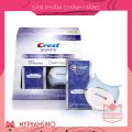 Set đèn và miếng dán trắng răng Crest Crest 3D White Whitestrips With Light Dental Whitening Kit. 